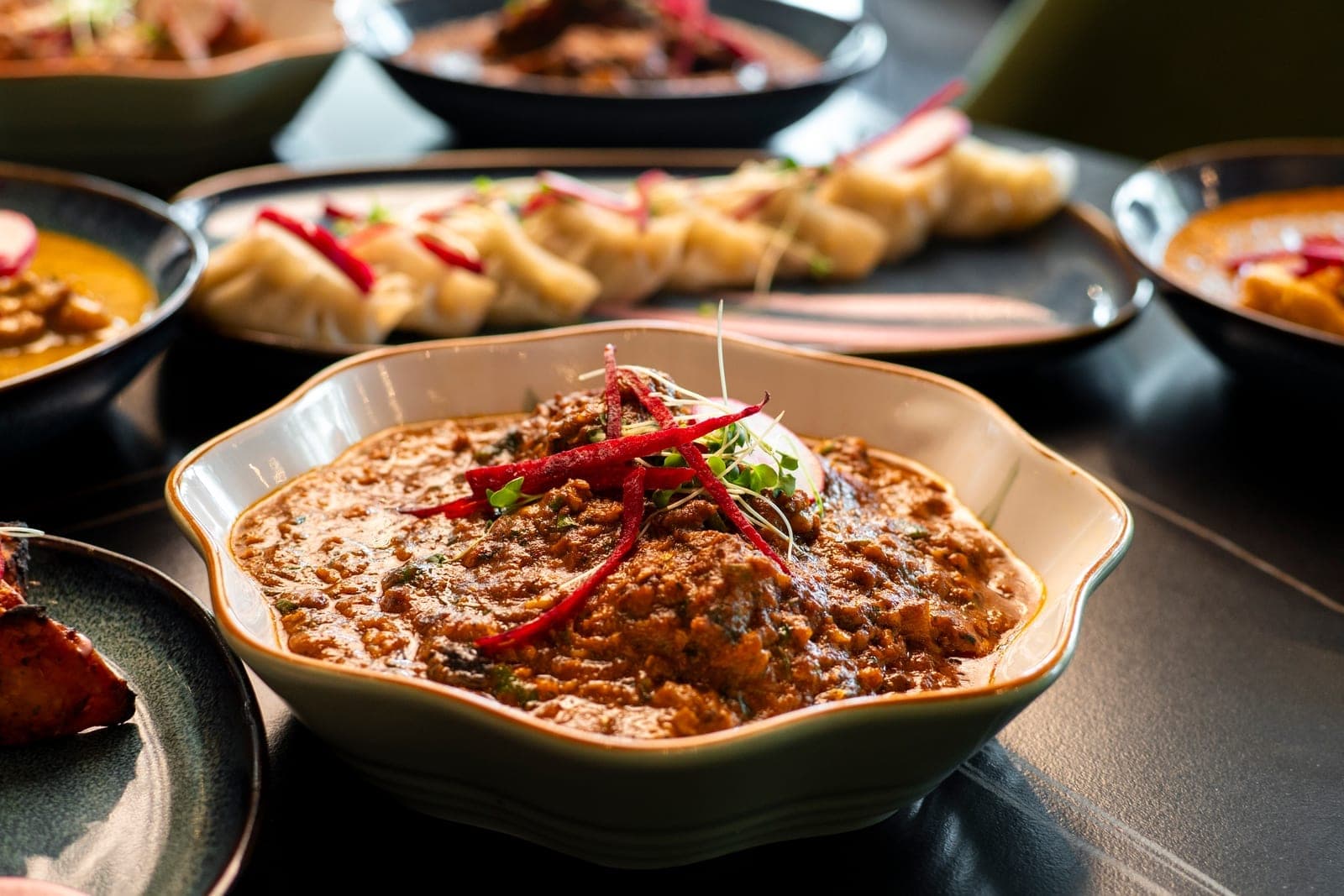 Curry and momos at DesINorth Milton — Indian & Hakka restaurant in Milton, Ontario